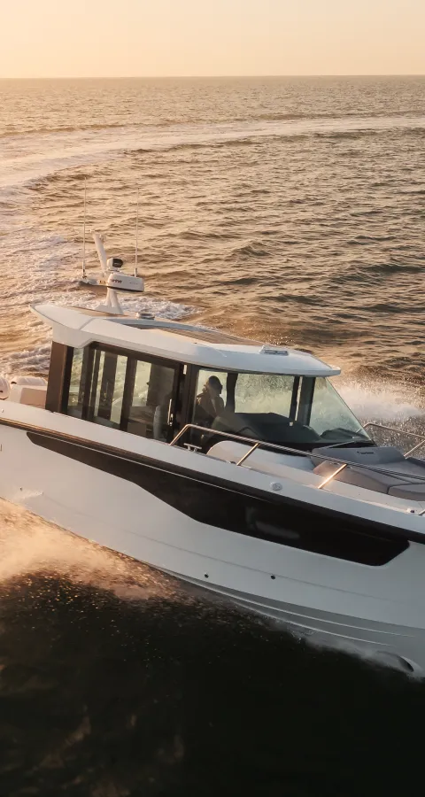 Yamarin Aura Cabin pilothouse motor boat in sunset
